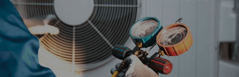 Technician performing furnace repair San Diego CA service in a San Diego home
