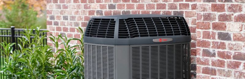 HVAC technician van outside a San Diego home providing AC company services